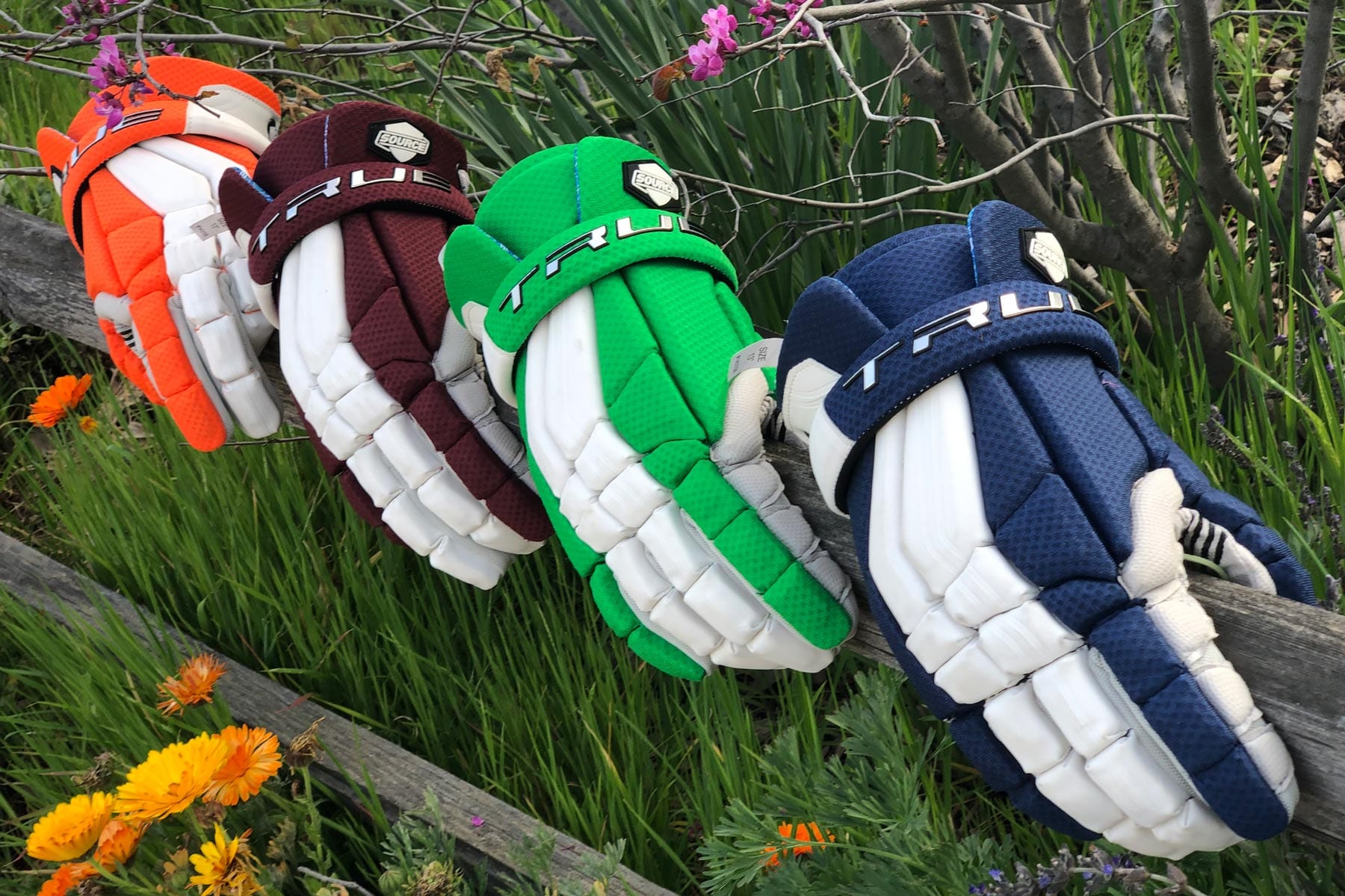 Custom gloves in your team colors from Lacrosse Fanatic